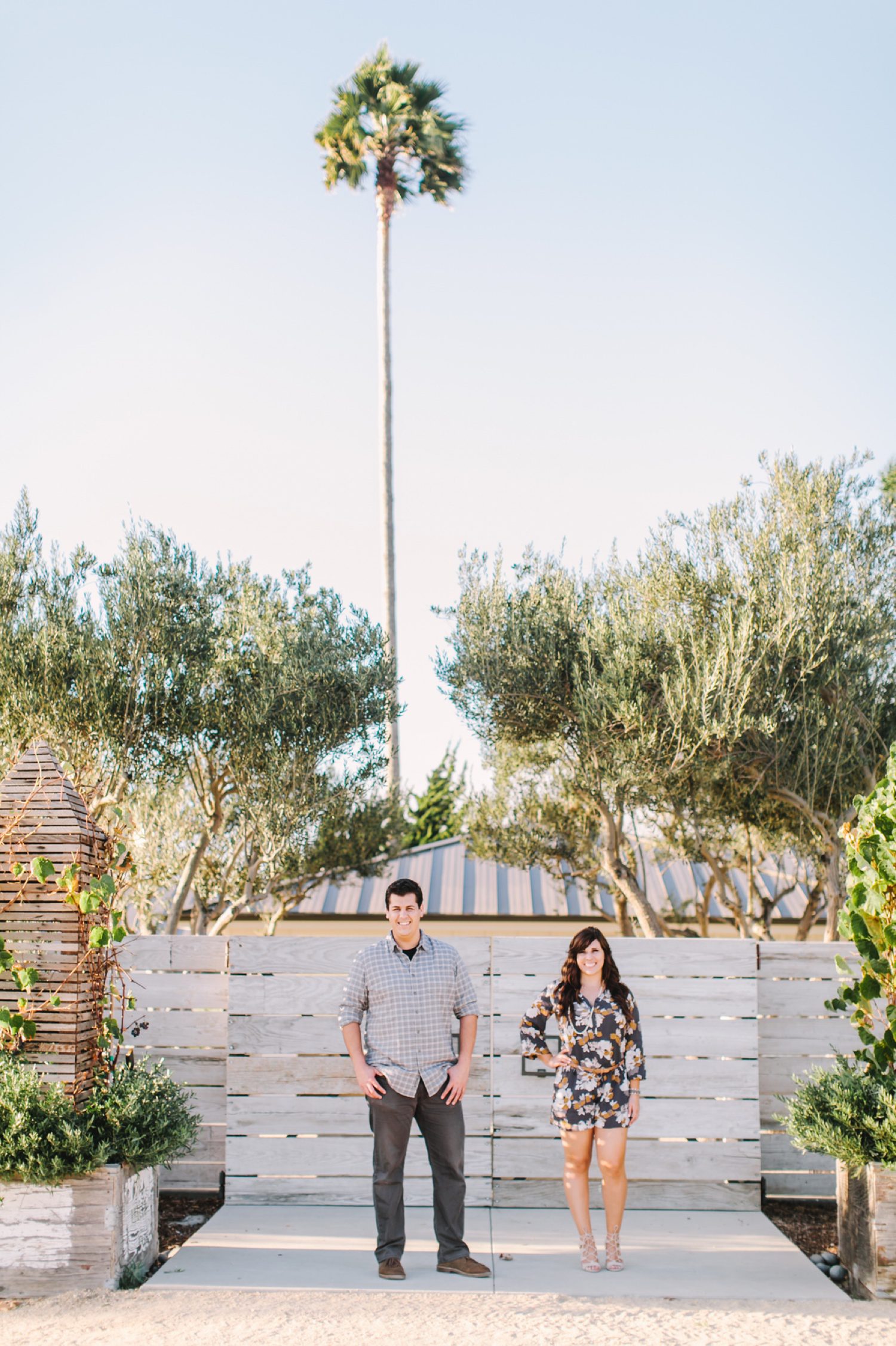 Best San Luis Obispo Wedding Venues Biddle Ranch Winery couple in neutral outfit for engagement session by photographer Jessica Sofranko