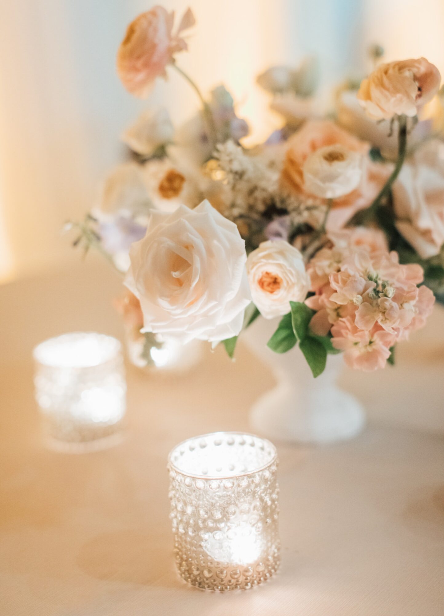 evening lit reception florals by Elegant Details at the White Barn Edna Valley photographed by san luis obispo wedding photographers jessica sofranko
