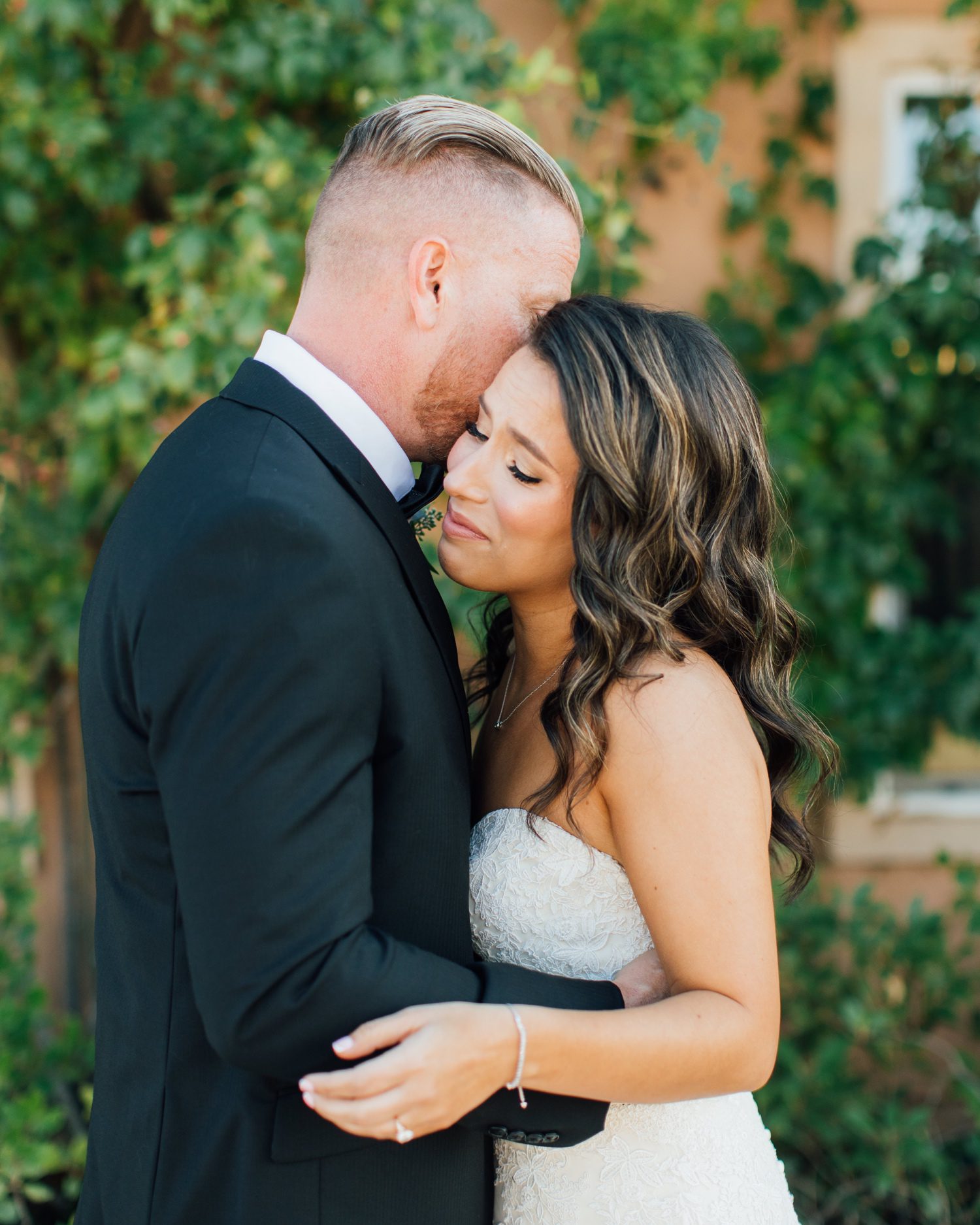 Bride and groom's tearful first look at european chateau inspired wedding in Paso Robles by photographer Jessica Sofranko