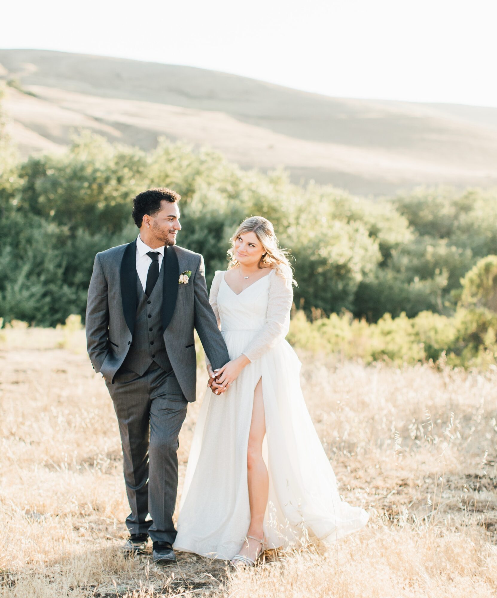 Bride and groom couple sunset portraits at their Harmony Chapel wedding in Cambria, CA