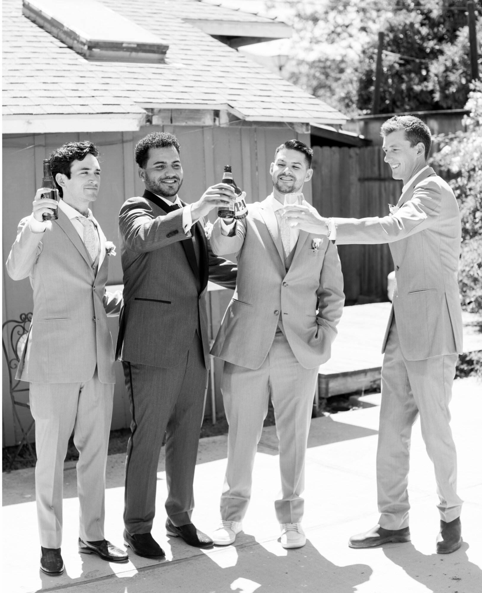 groom toasting with groomsmen