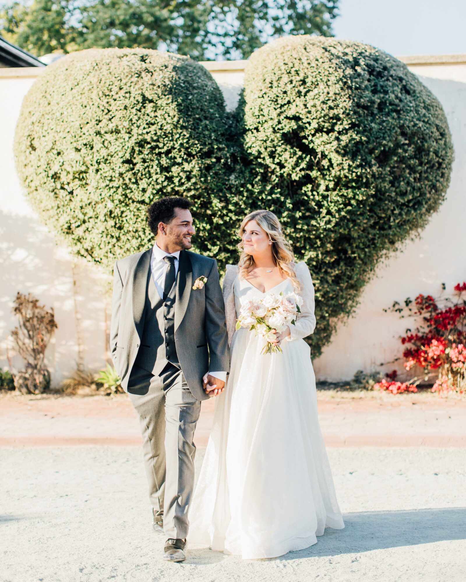 Bride and groom couple sunset portraits at their Harmony Chapel wedding in Cambria, CA