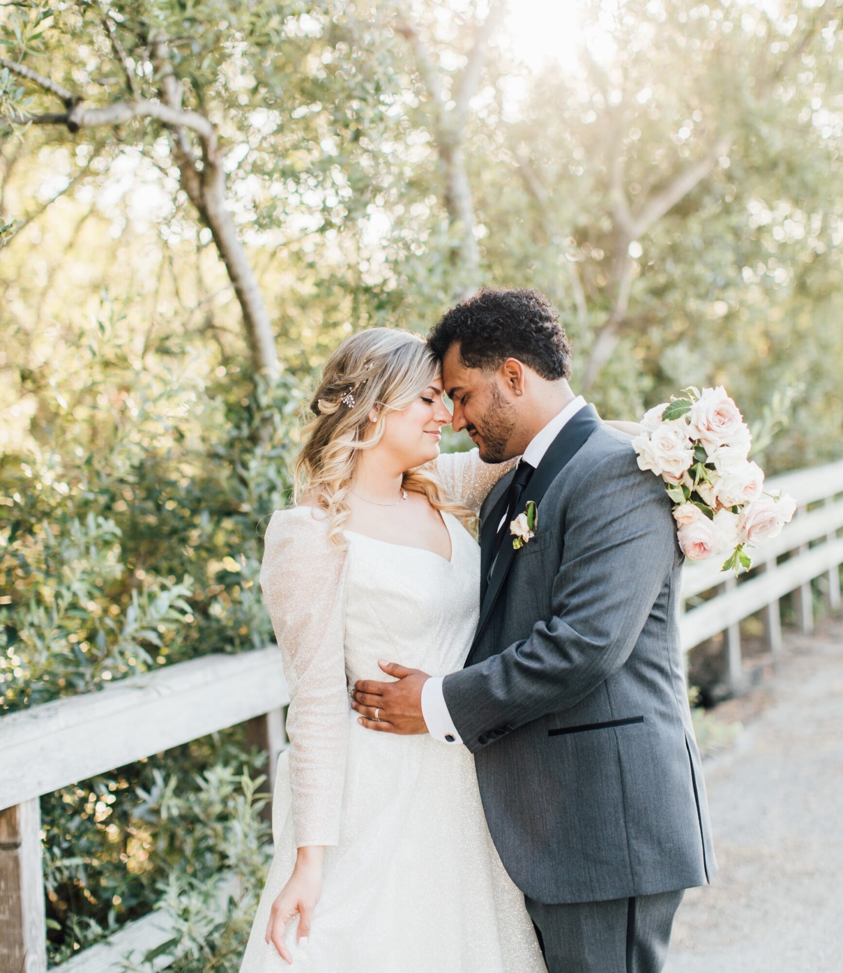 Bride and groom couple sunset portraits at their Harmony Chapel wedding in Cambria, CA
