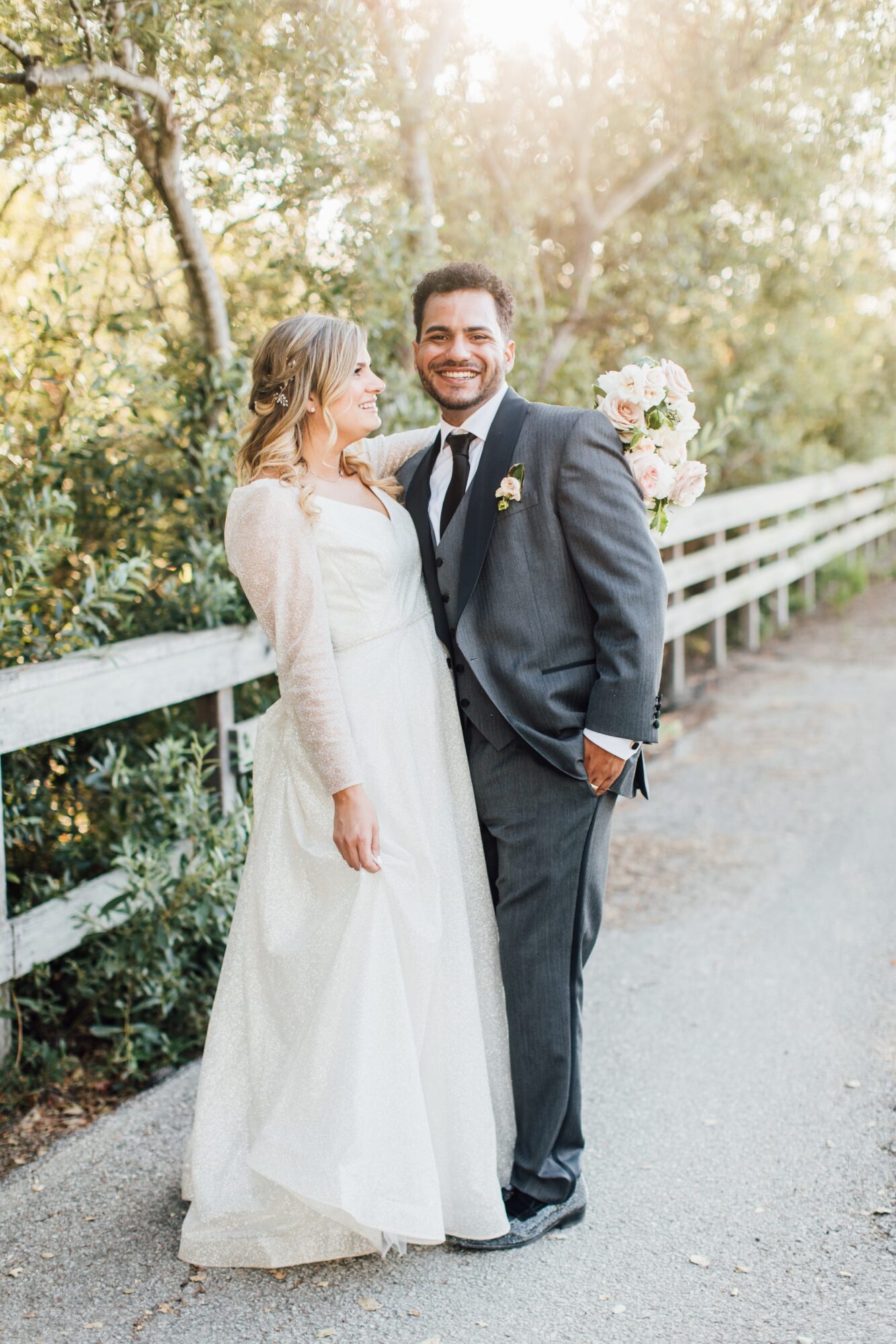 Bride and groom couple sunset portraits at their Harmony Chapel wedding in Cambria, CA