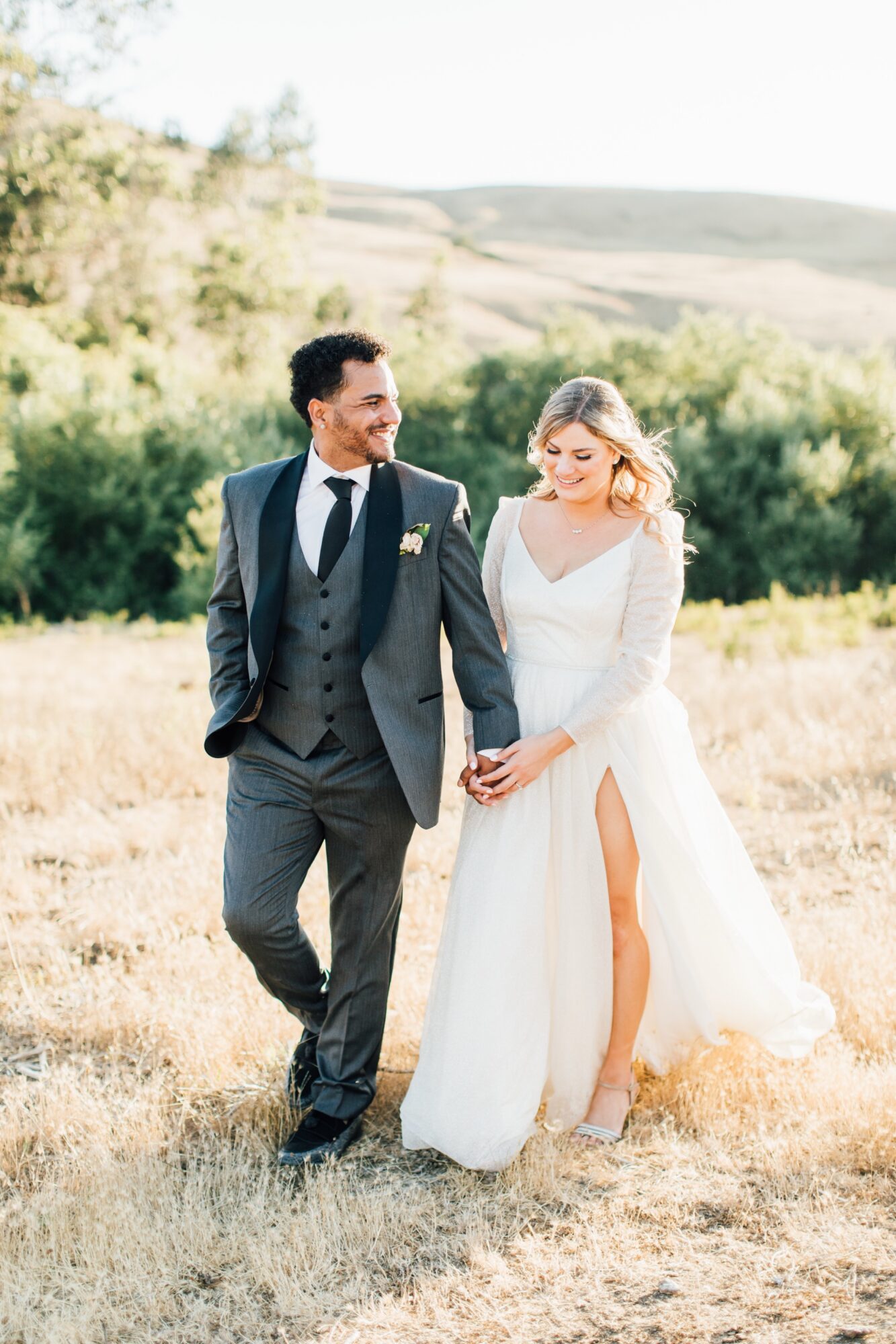 Bride and groom couple sunset portraits at their Harmony Chapel wedding in Cambria, CA