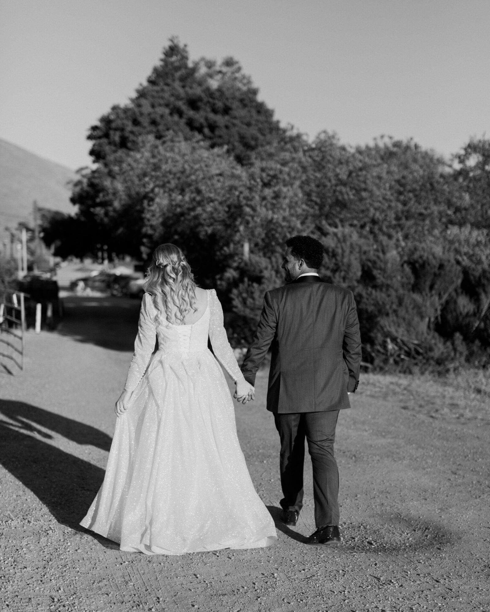Bride and groom couple sunset portraits at their Harmony Chapel wedding in Cambria, CA