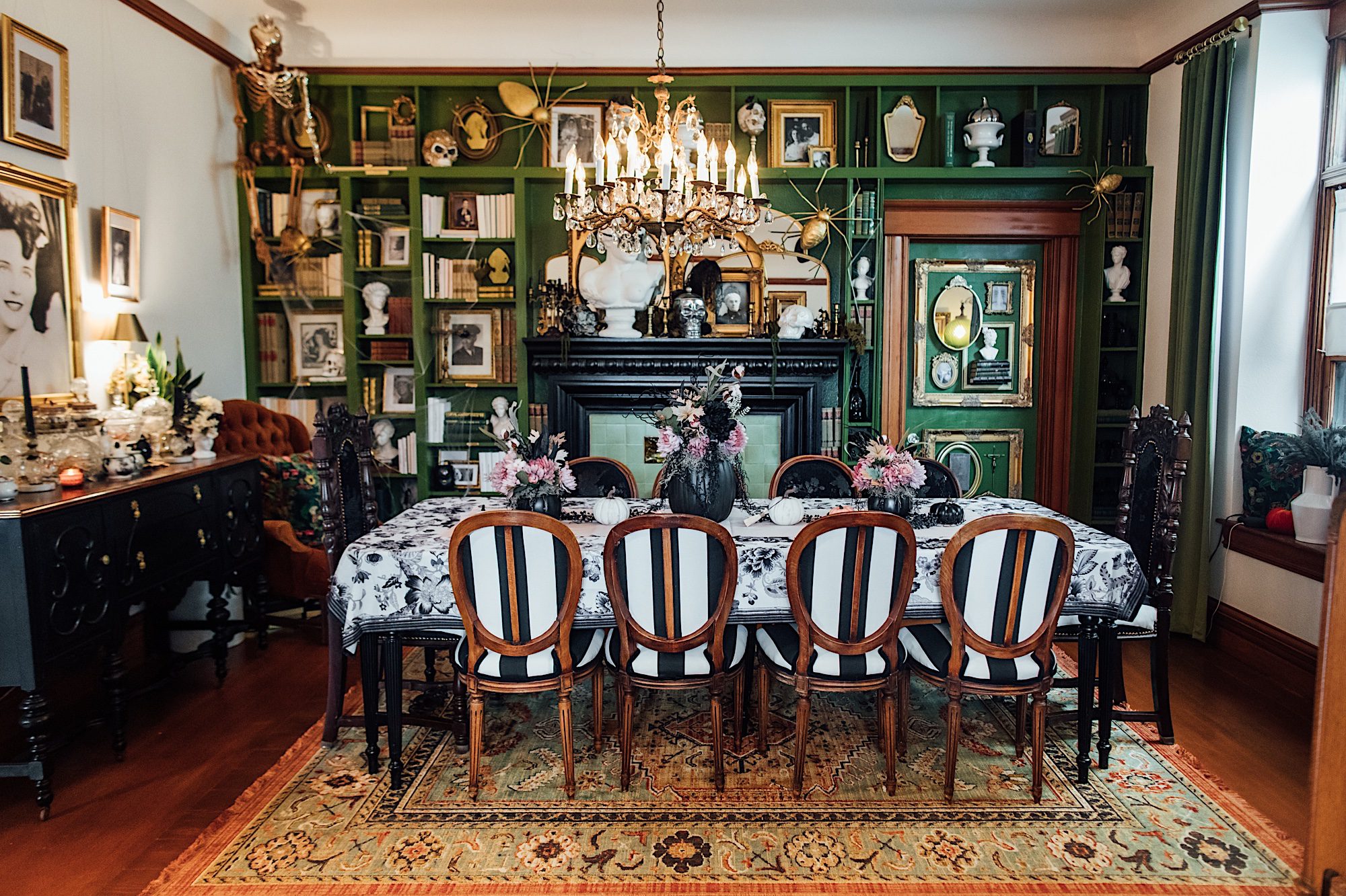 formal dining room inside of victorian haunted mansion by photographer Jessica Sofranko