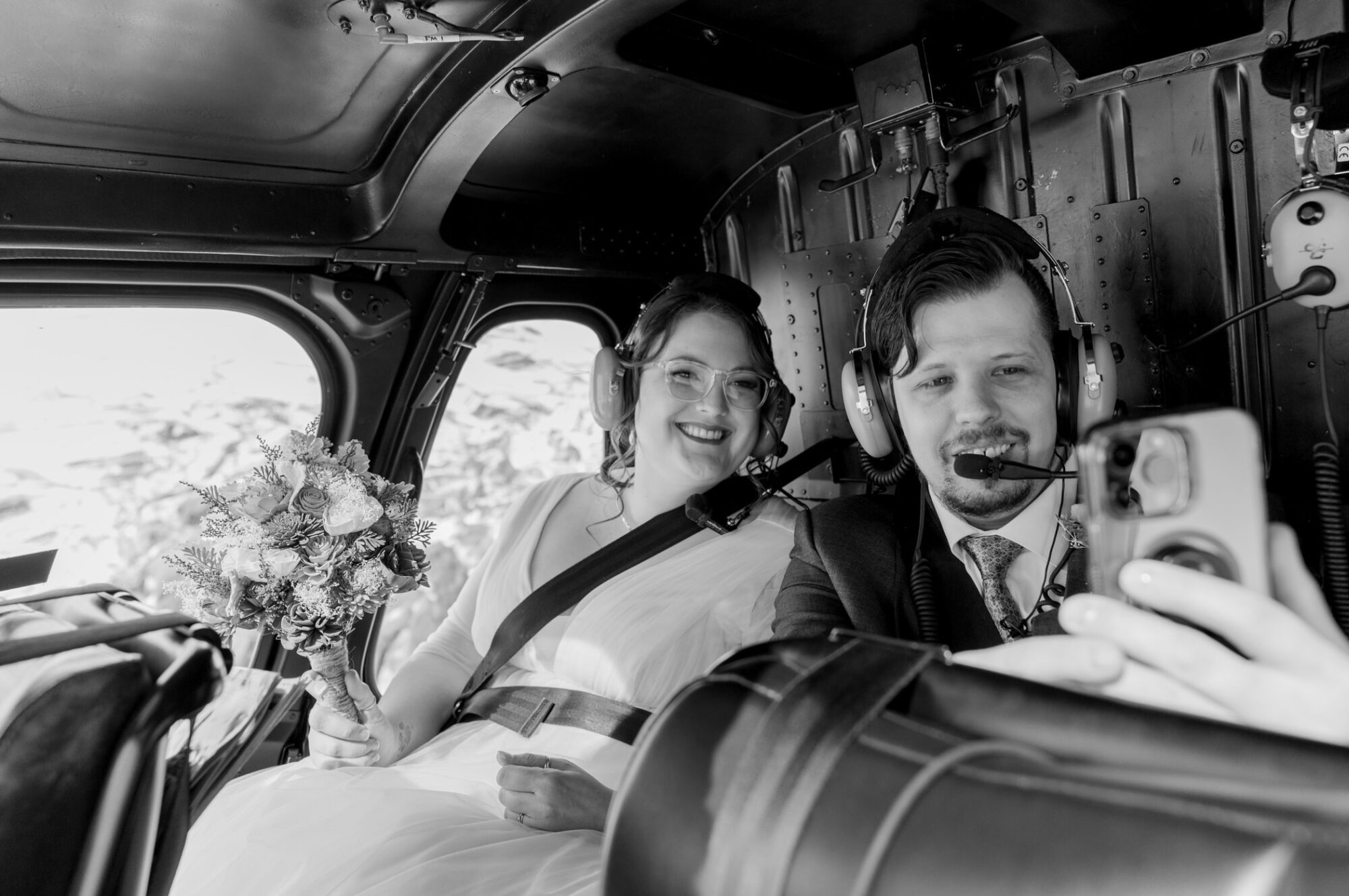 Bride & groom getting ready for their helicopter tour at Alaska Glacier Lodge