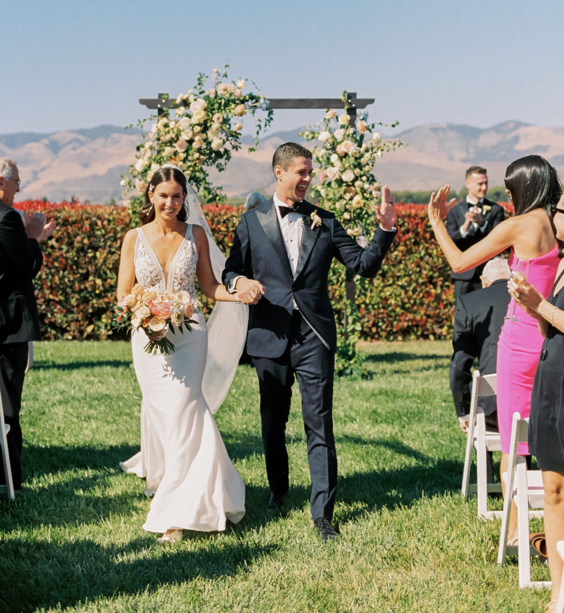 Ceremony with a view of the hills, florals by Elegant Details with Elyse Events at the White Barn Edna Valley photographed by san luis obispo wedding photographers jessica sofranko