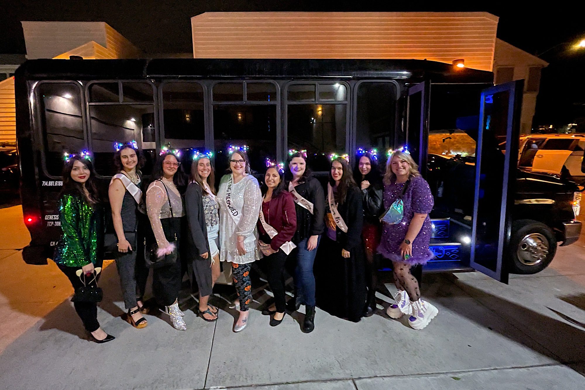 group of ladies wearing light up cat ears for hocus pocus drag show getting meowied last meow before the vow halloween cat themed bachelorette party