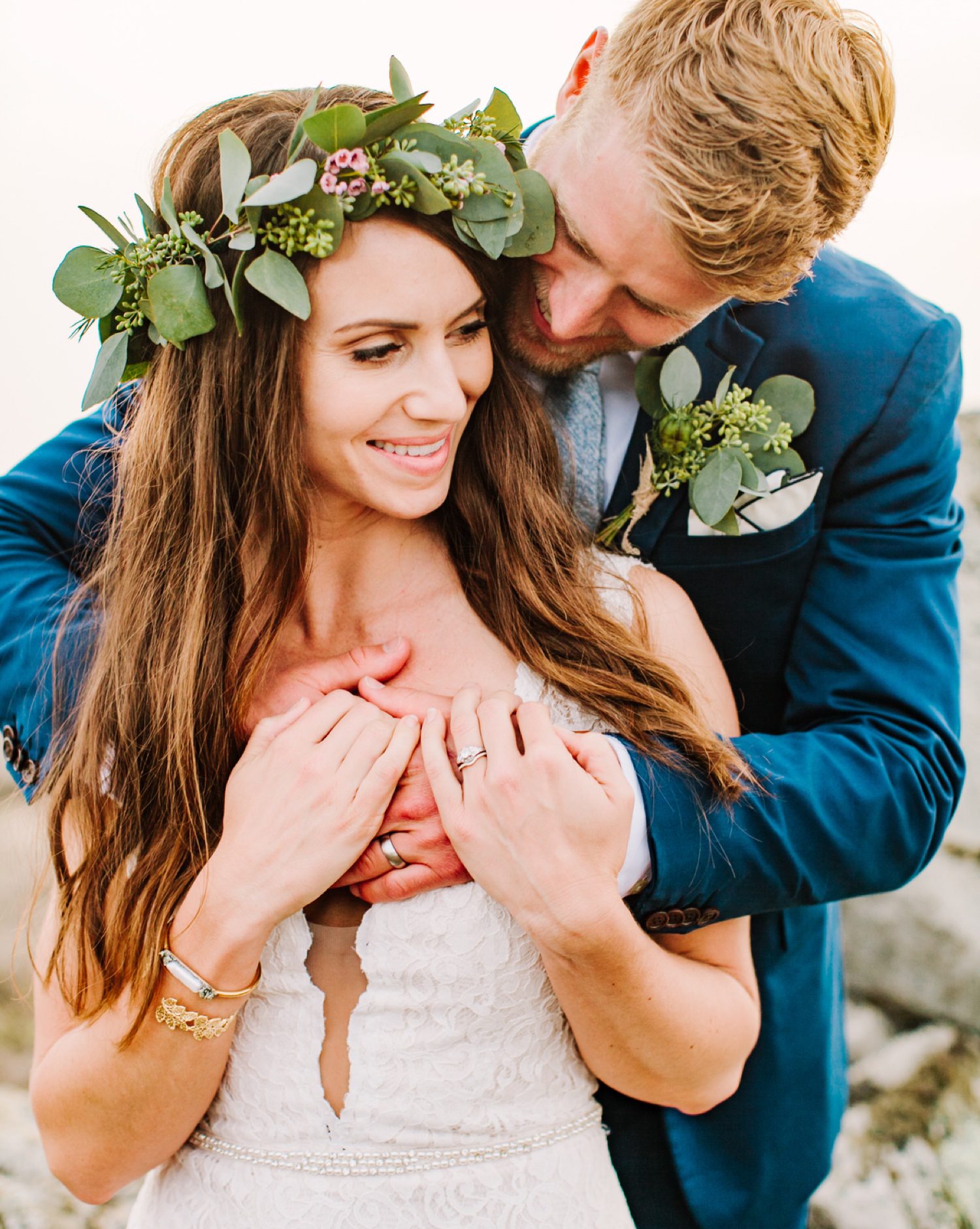 Groom wrapping his arms around bride during Central Coast California wedding