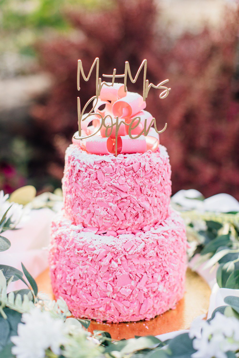 pink champagne cake at Madonna Inn wedding photos by Jessica Sofranko in San Luis Obispo California