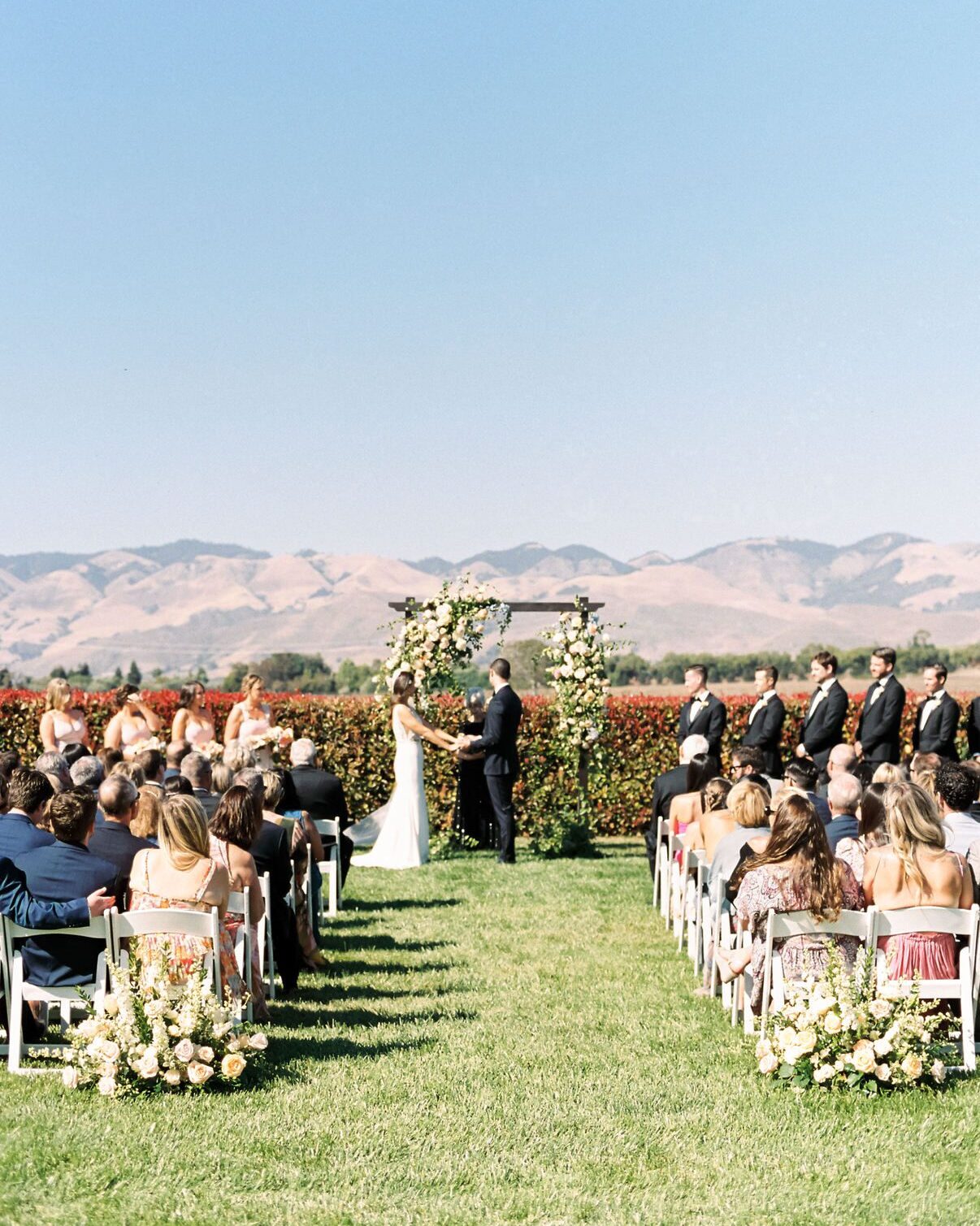 Best San Luis Obispo wedding venues The White Barn Edna Valley ceremony site with view of rolling SLO hills