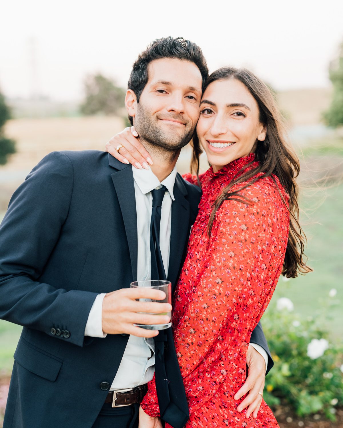 Best San Luis Obispo wedding venues La Lomita Ranch couple cuddling at cocktail hour